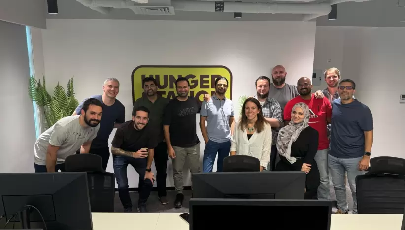 parte del equipo del gth de pedidosya con el de hunger station