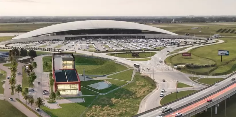 Imagen aérea de Aeropuerto de Carrasco con render de centro TUMO Uruguay. Fuente: Gentileza Corporación América.