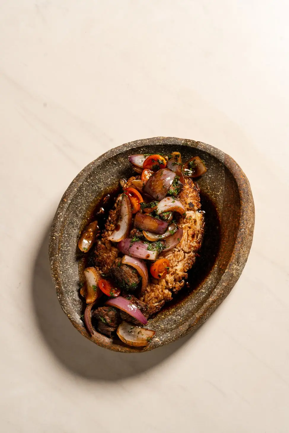 Tacu tacu con lomo saltado. 